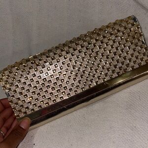 Glamorous Gold Textured Clutch with Sparkly Finish
